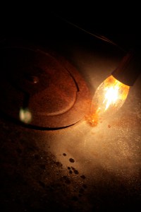 Christmas Light on Rusty Metal